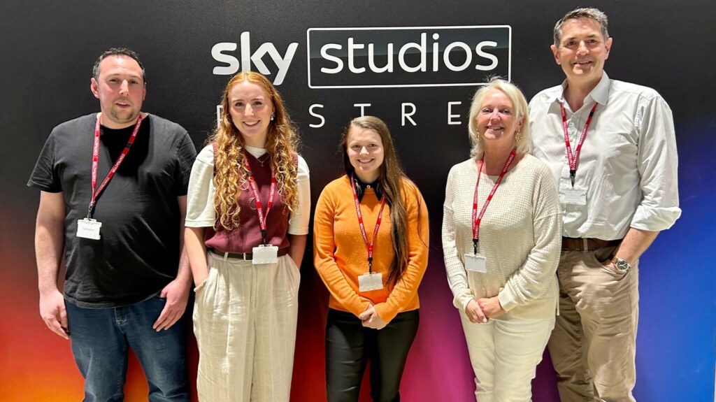 Group photo of film and TV production team emphasizing storage and reuse management.